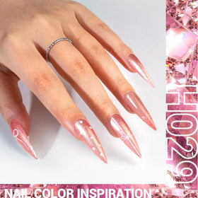 Gros plan sur le pinceau du vernis gel pailleté rose MelodySusie