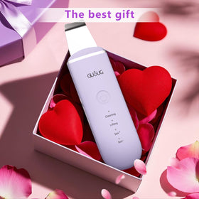 GUGUG spatule de nettoyage de peau violet en action sur le visage
