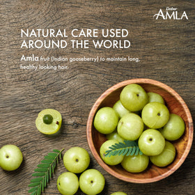 Huile de cheveux Amla Dabur dans un cadre de salle de bain