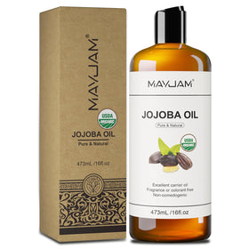 Huile de jojoba MAYJAM versée dans une petite cuillère