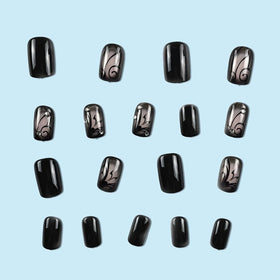 juggssa Faux Ongles Pressés en gros plan montrant la texture et la finition