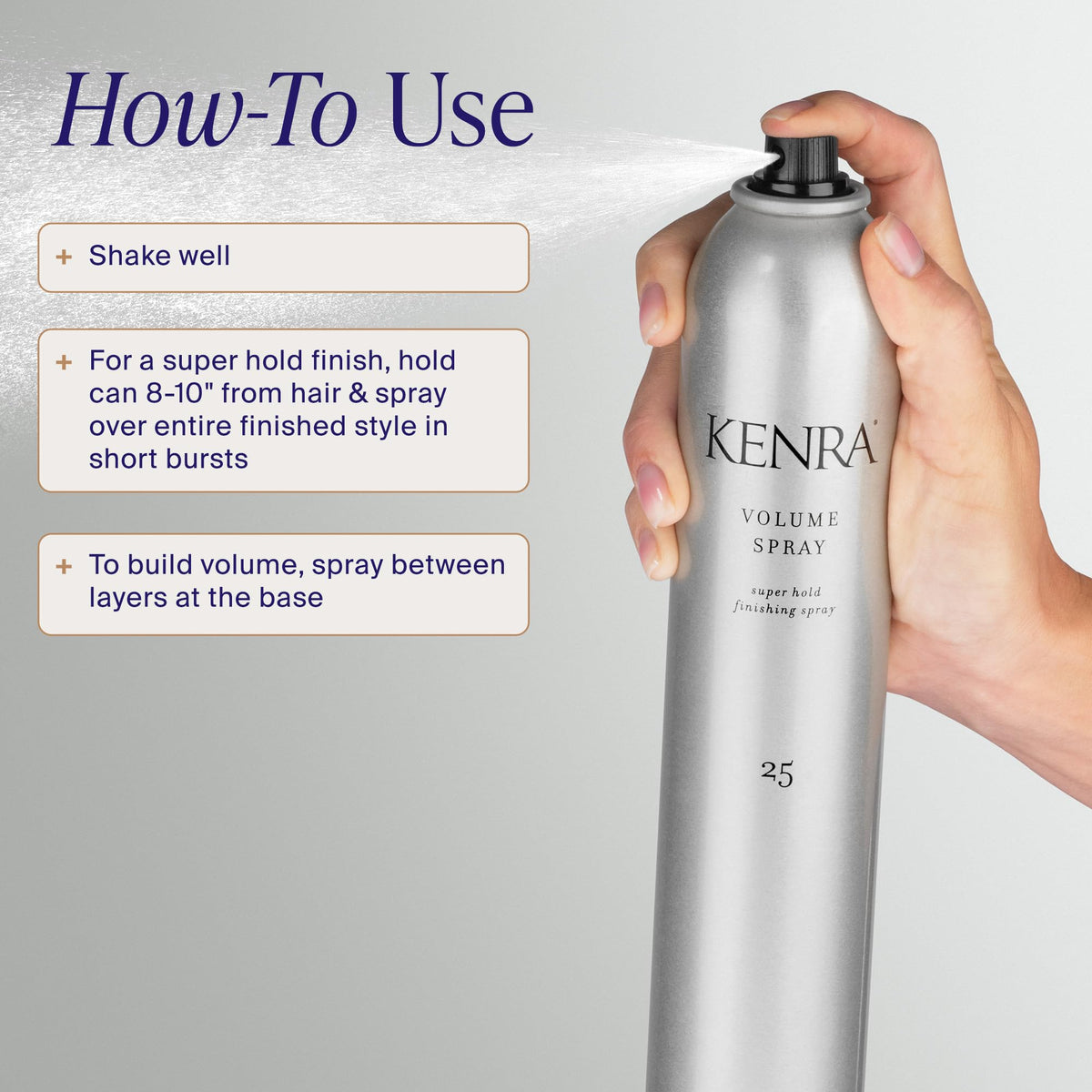 Kenra Volume Spray 25 posé sur une coiffeuse avec des accessoires de cheveux