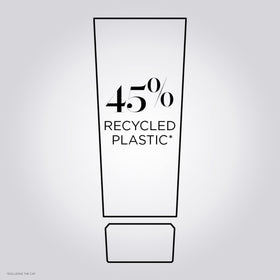 KÉRASTASE Densifique après-shampooing 210g sur une surface en marbre