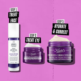 Kiehl's Crème Contour des Yeux Multi-Correctrice 85g sur une table avec d'autres produits de soin