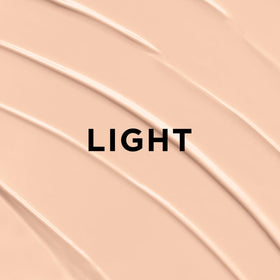 L'Oreal Paris BB Cream Hydratant Teinté 1 fl oz sur une table de maquillage
