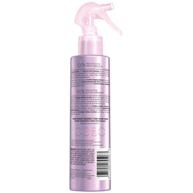 L'Oreal Paris Glaze Acide Brillant 6,7 oz sur un fond floral
