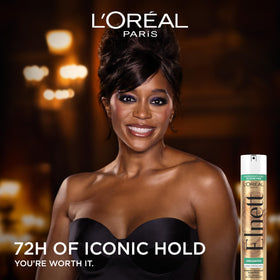 Laque Elnett de L'Oreal Paris 381g en application sur des cheveux