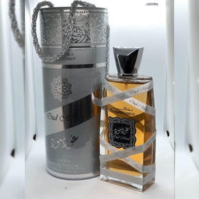 Lattafa Oud Mood Reminiscence Eau de Parfum 100 ml sur une surface élégante
