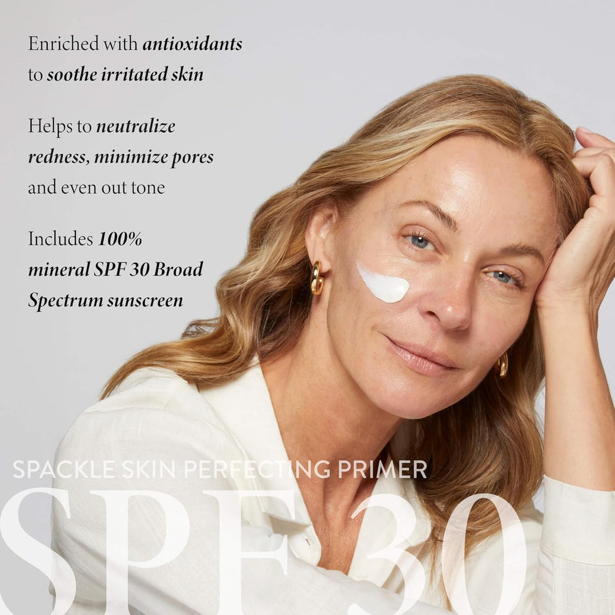 LAURA GELLER Spackle Primer application sur le visage