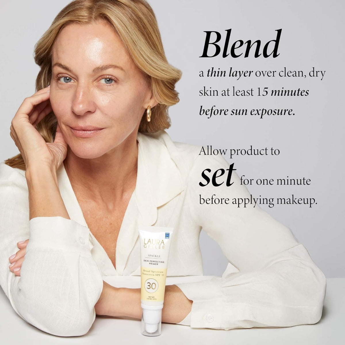 LAURA GELLER Spackle Primer sur un bureau de maquillage