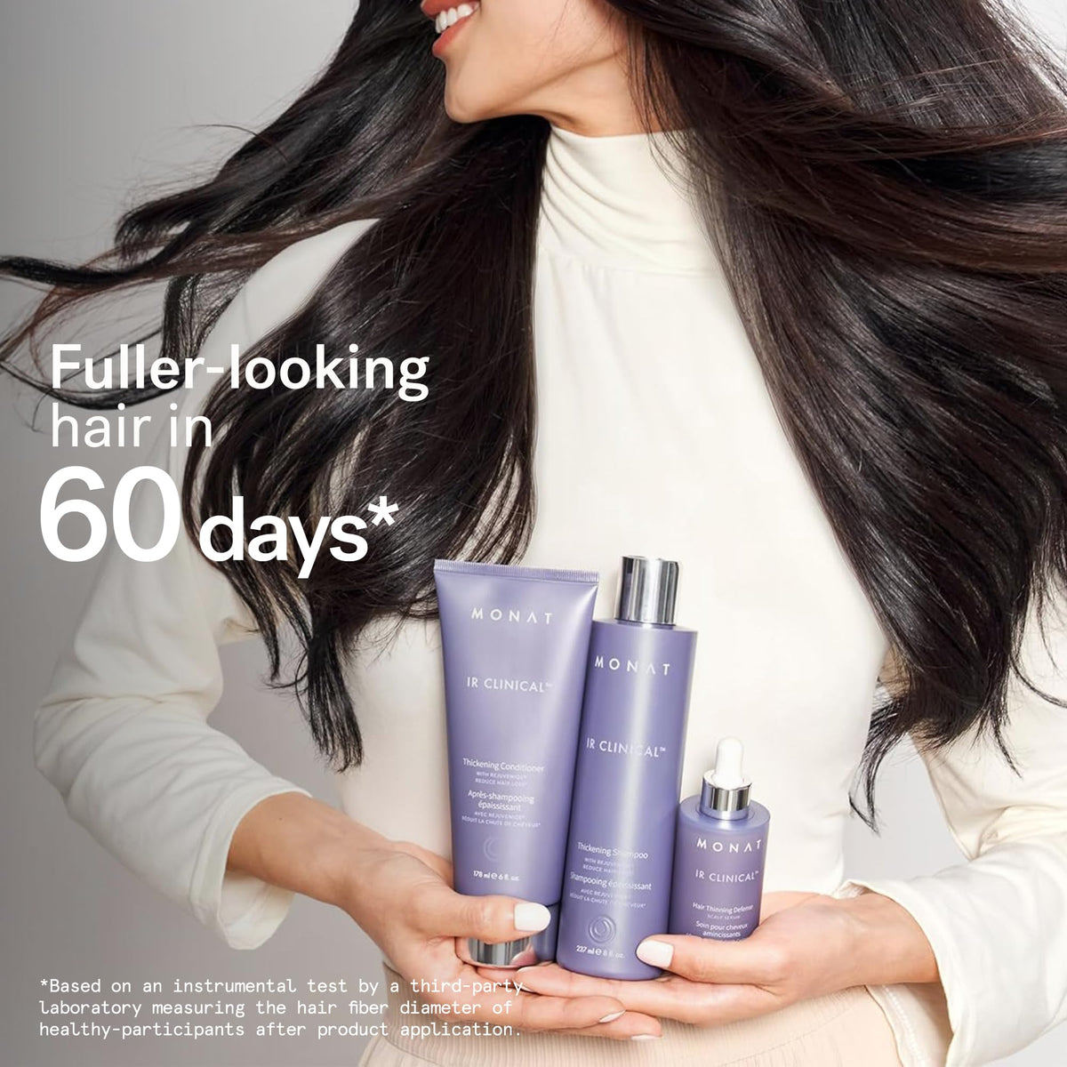 Lifestyle image of MONAT hair care products in a bathroom setting