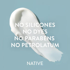 Lotion Native Corps Sea Salt & Cedar près d'une plante