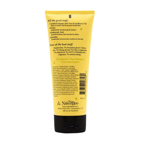 Lotion nourrissante corps The Naked Bee 200 ml avec texture crémeuse sur une main