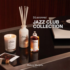 Maison Margiela Jazz Club Eau de Toilette 100ml sur un bureau