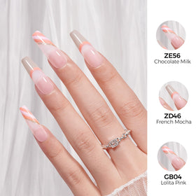 Manucure avec le vernis à ongles gel TOMICCA sur les mains