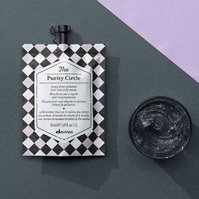 Masque Davines avec ingrédients naturels en arrière-plan