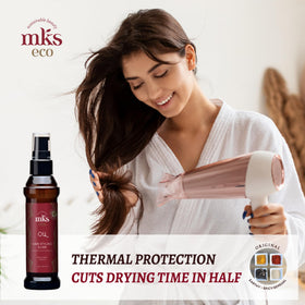 MKS eco Oil d'Earthly Body sur une surface en bois