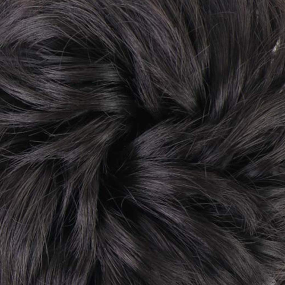 MORICA chignon désordonné brun noir porté par une femme