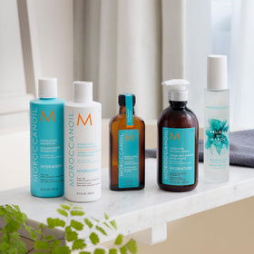 Moroccanoil Crème Coiffante Hydratante 340g application sur cheveux
