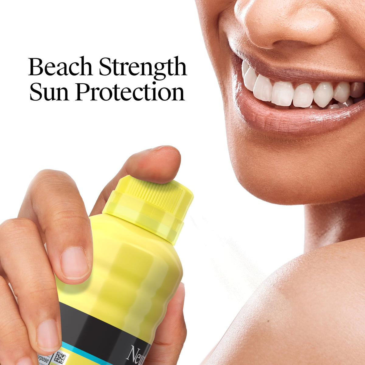 Neutrogena Beach Defense Spray SPF 30 sur une serviette de plage