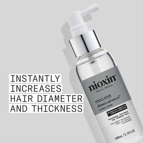 Nioxin Diamax Advanced Sérum Épaississant application sur cheveux