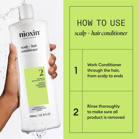 NIOXIN Système 2 après-shampooing 558g en main
