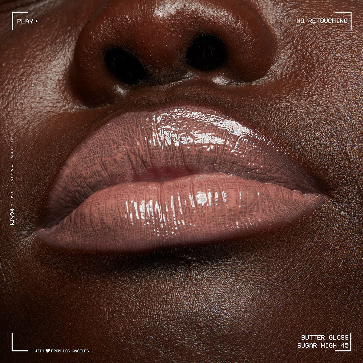 NYX Butter Gloss Brown Sugar on a vanity table