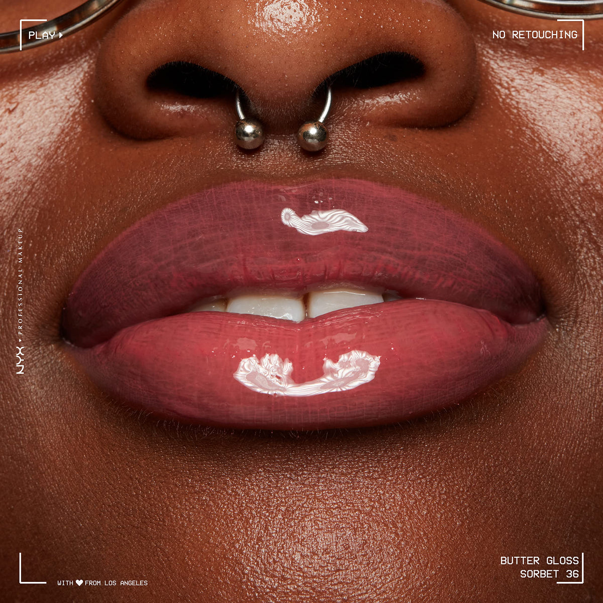 NYX Butter Gloss Sorbet 10g sur une table de maquillage