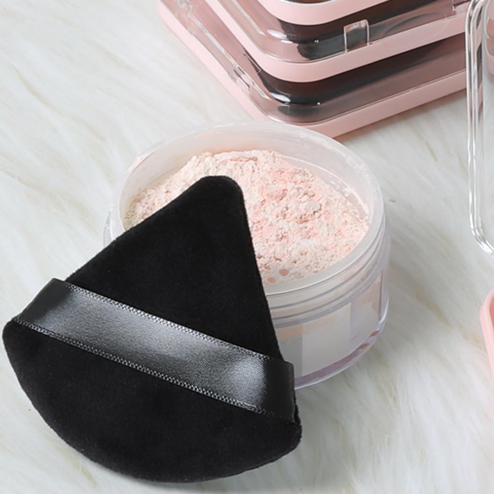 Ocim Poudres Puff Triangle en utilisation sur le visage