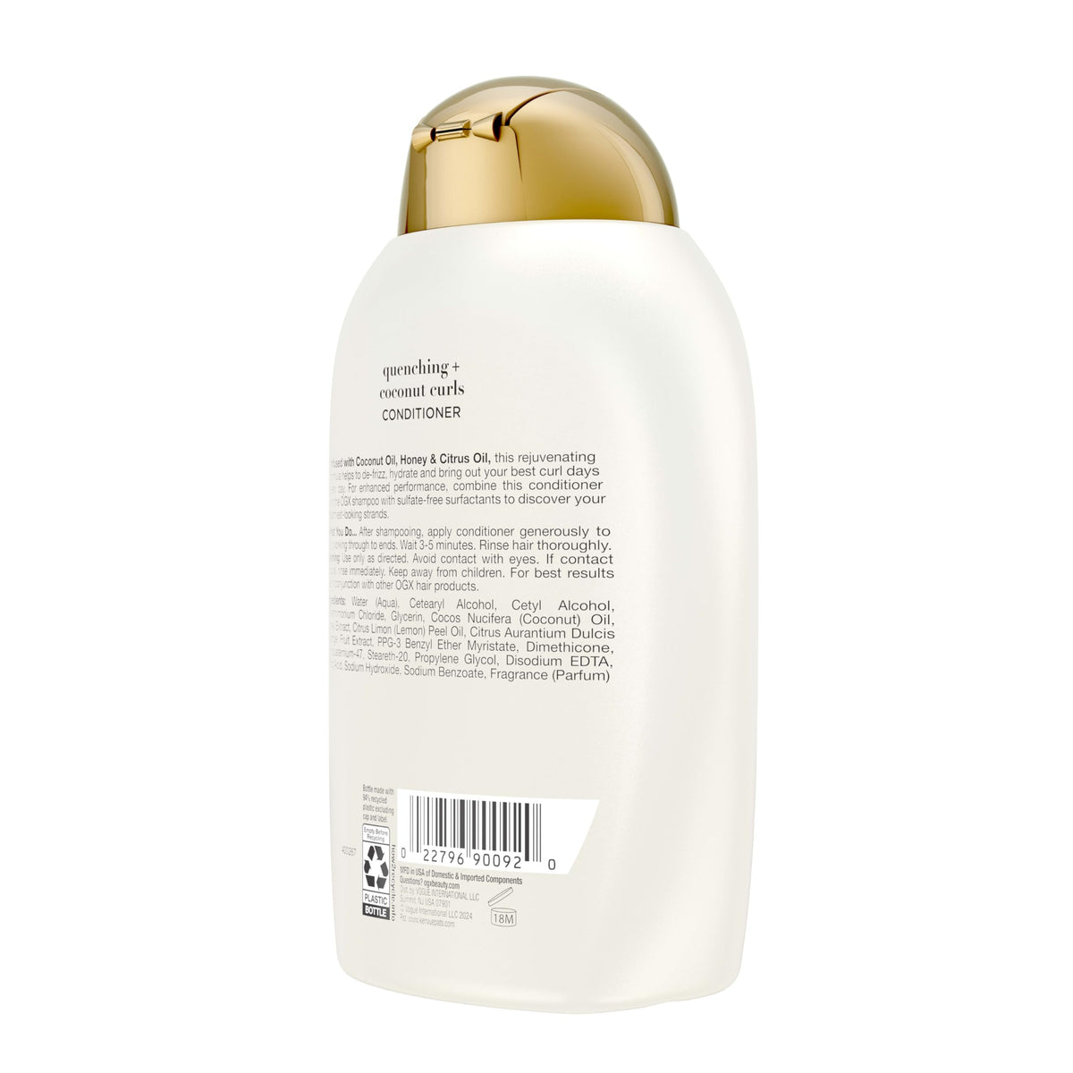 OGX Quenching Coconut Curls - bouteille ouverte avec produit