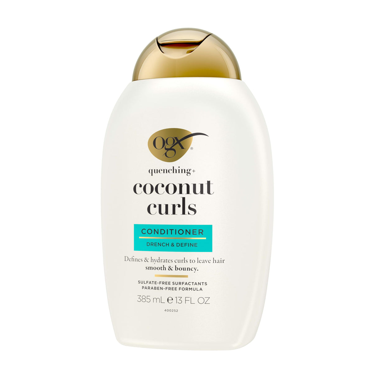 OGX Quenching Coconut Curls - ingrédients naturels sur fond