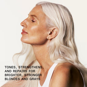 Olaplex N°.4P Shampoo Violet 250 mL sur un fond blanc