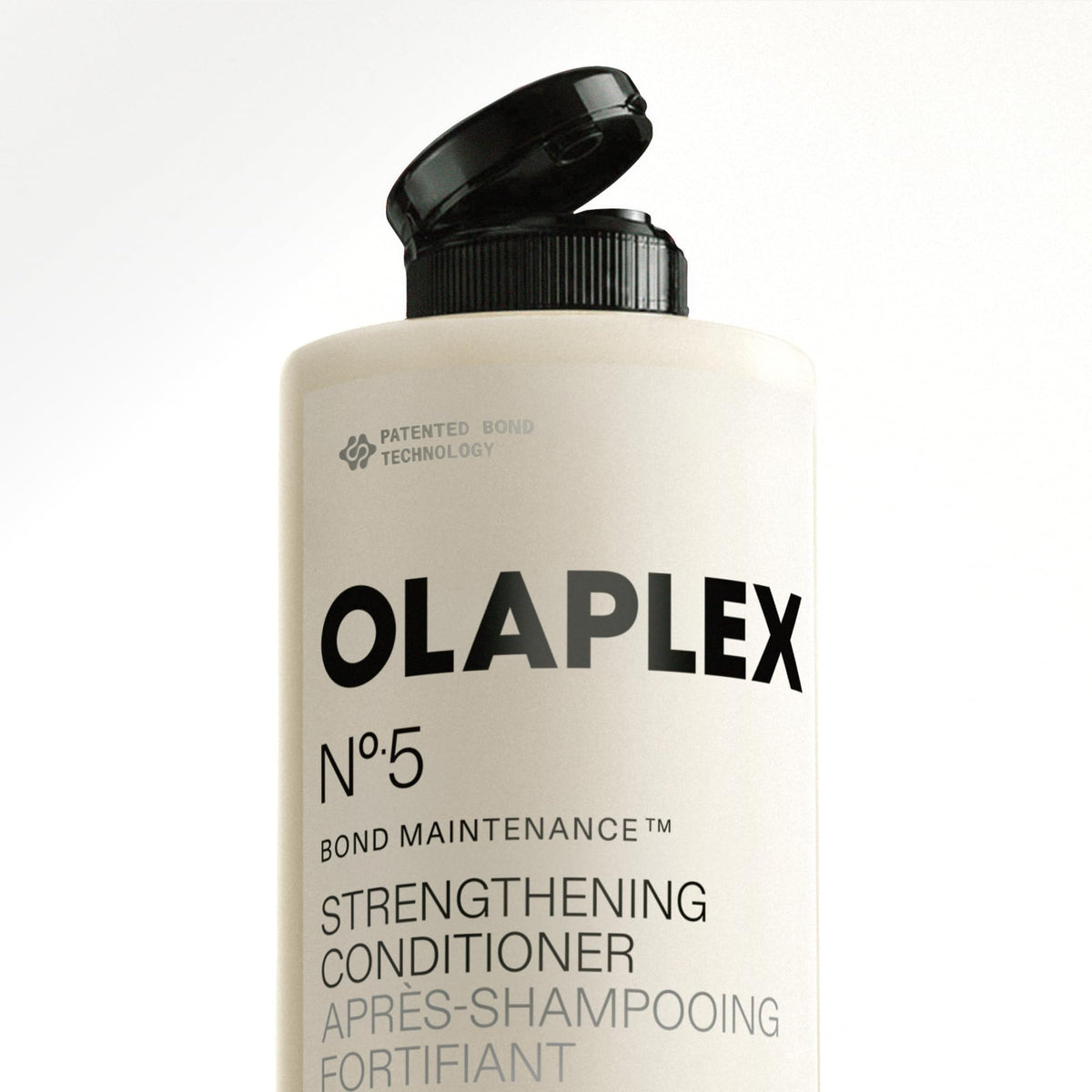 Olaplex N°.5 Après-Shampooing 100 mL en application sur les pointes