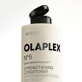 Olaplex N°.5 Après-Shampooing 100 mL en application sur les pointes