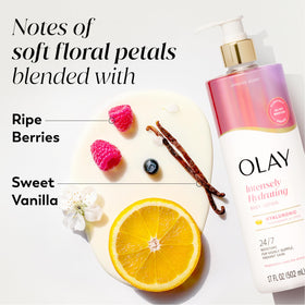 Olay lotion corporelle sur une table avec des fleurs