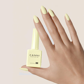 Ongles manucurés avec vernis à ongles CANNI jaune pastel