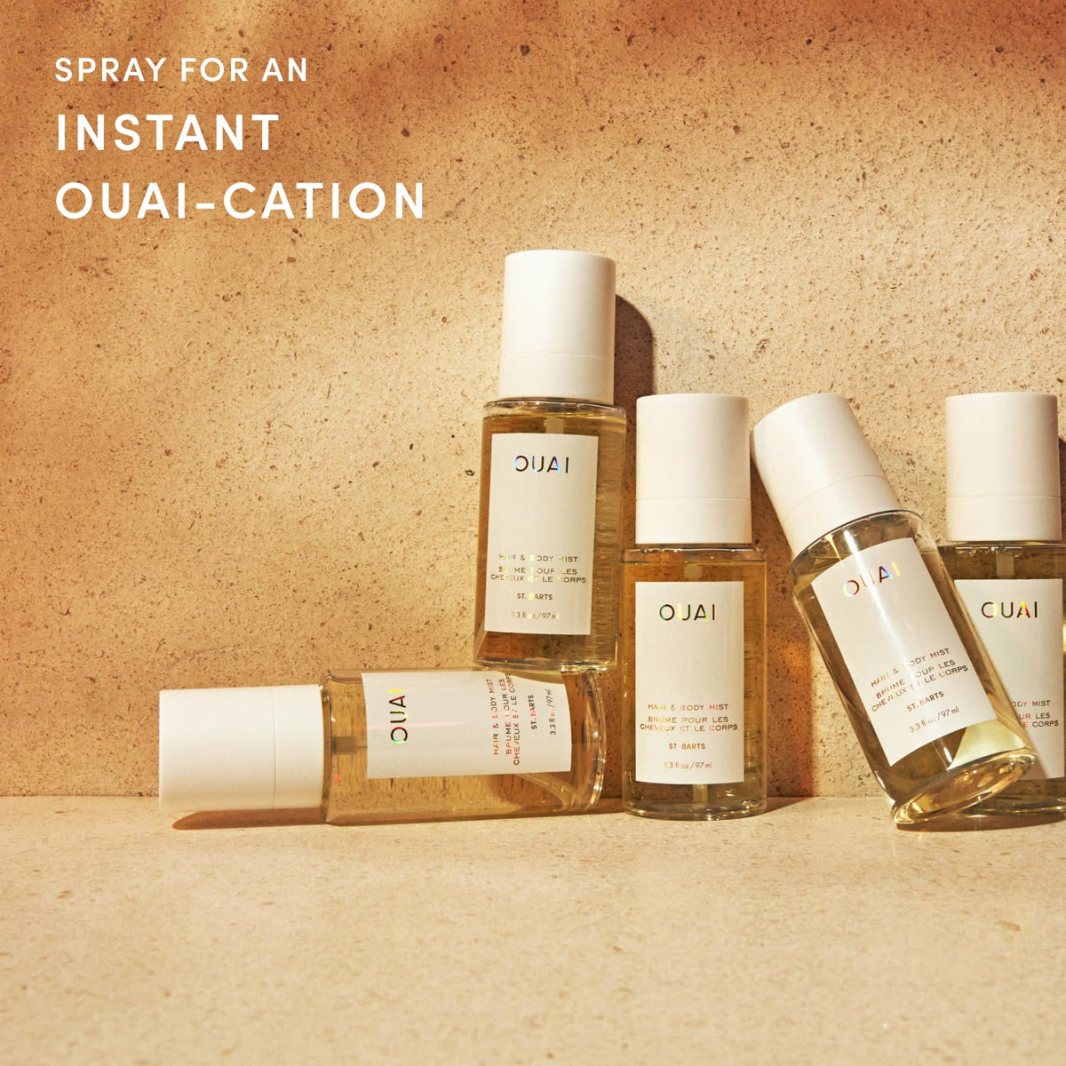 OUAI St. Barts Spray sur fond de plage tropicale