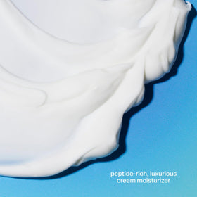 Packaging de la crème hydratante Bubble Skincare sur une surface blanche.