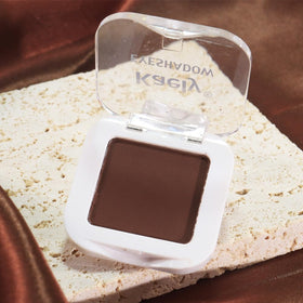 Palette de fard à paupières évpct sur une table de maquillage
