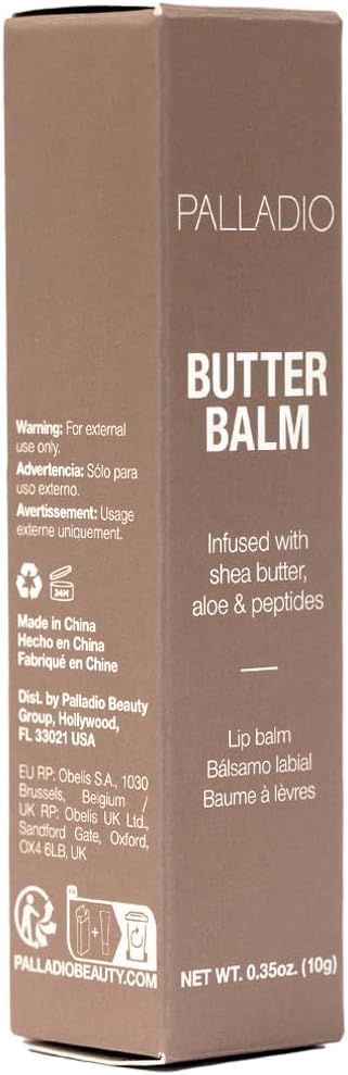 Palladio Butter Balm tube à côté d'une fleur
