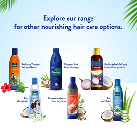 Parachute Advansed Huile de Coco sur une table avec des noix de coco