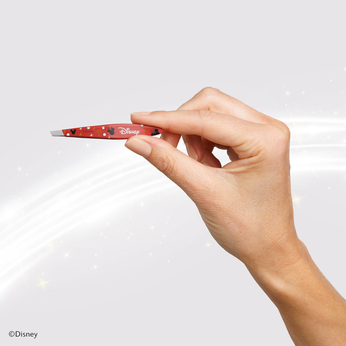 Pince à épiler Tweezerman Mini Slant sur fond blanc