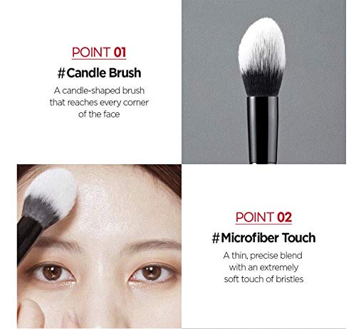 Pinceau JUNG SAEM MOOL avec poudre sur un fond de maquillage