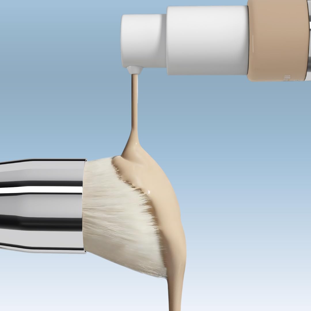 Pinceau PrimeSkin posé sur une surface avec un fond de teint