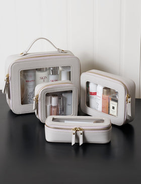 Pochette Popvibe sur un bureau avec accessoires de maquillage