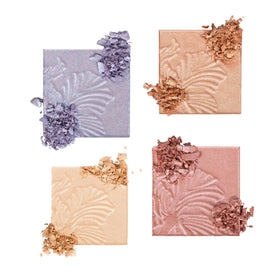Poudre illuminatrice MegaGlo wet n wild sur une table de maquillage