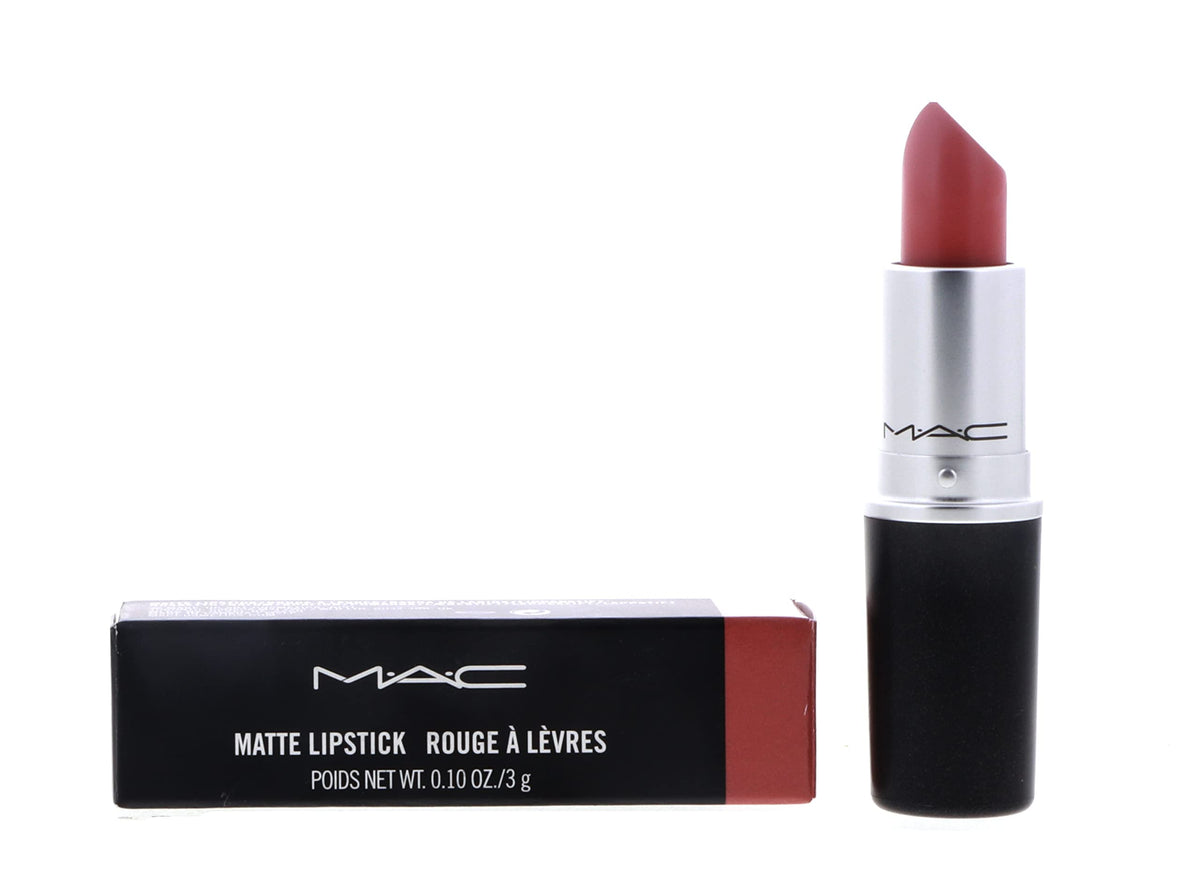 Rouge à lèvres MAC Kinda Sexy couleur Kinda Sexy sur une table