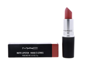 Rouge à lèvres MAC Kinda Sexy couleur Kinda Sexy sur une table
