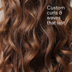 Rouleaux chauffants Conair avec des boucles volumineuses sur cheveux