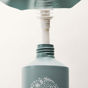RŌZ Foundation Conditioner in a bathroom setting